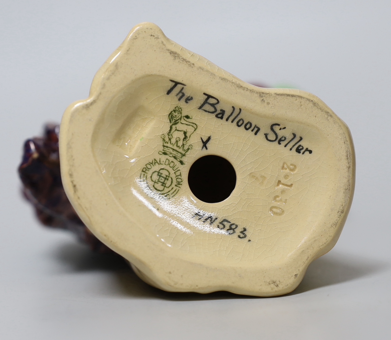 A Royal Doulton figure, 'The Balloon Seller', HN583